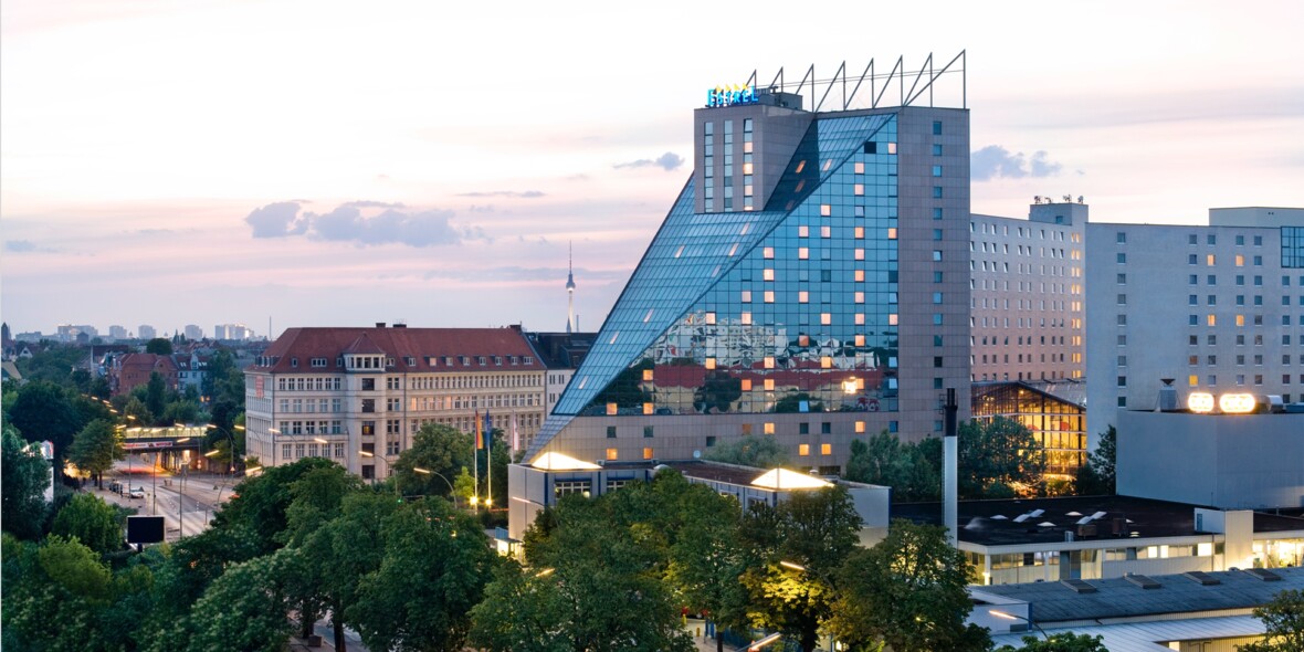 Estrel Hotel Exterior view of the Estrel Hotel Berlin during sunset
